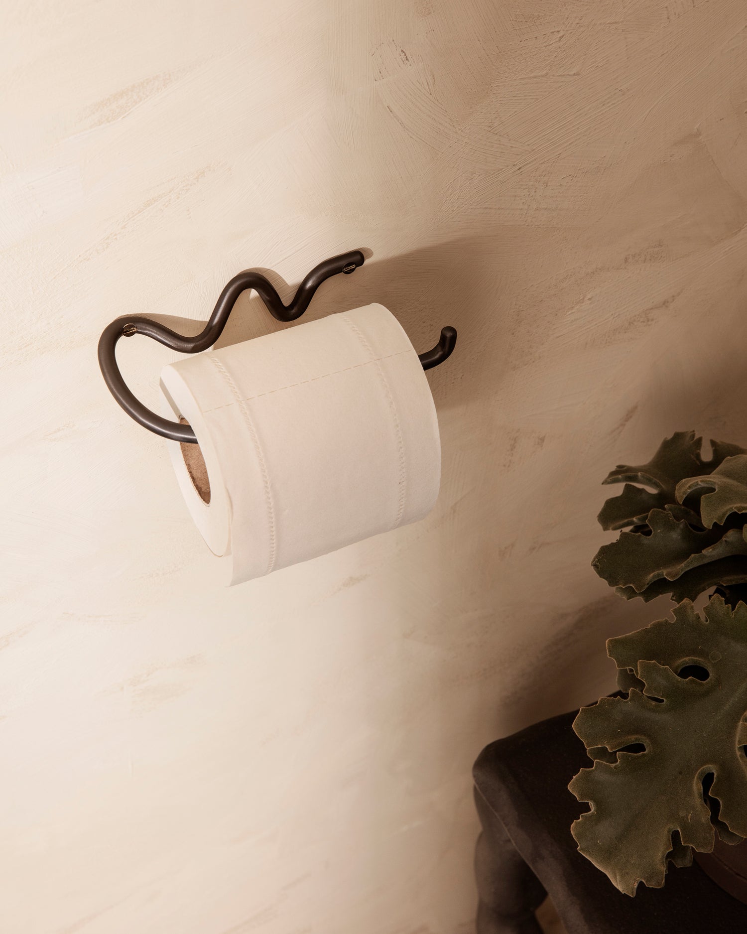 Curvature Toilet Paper Holder - Black Brass