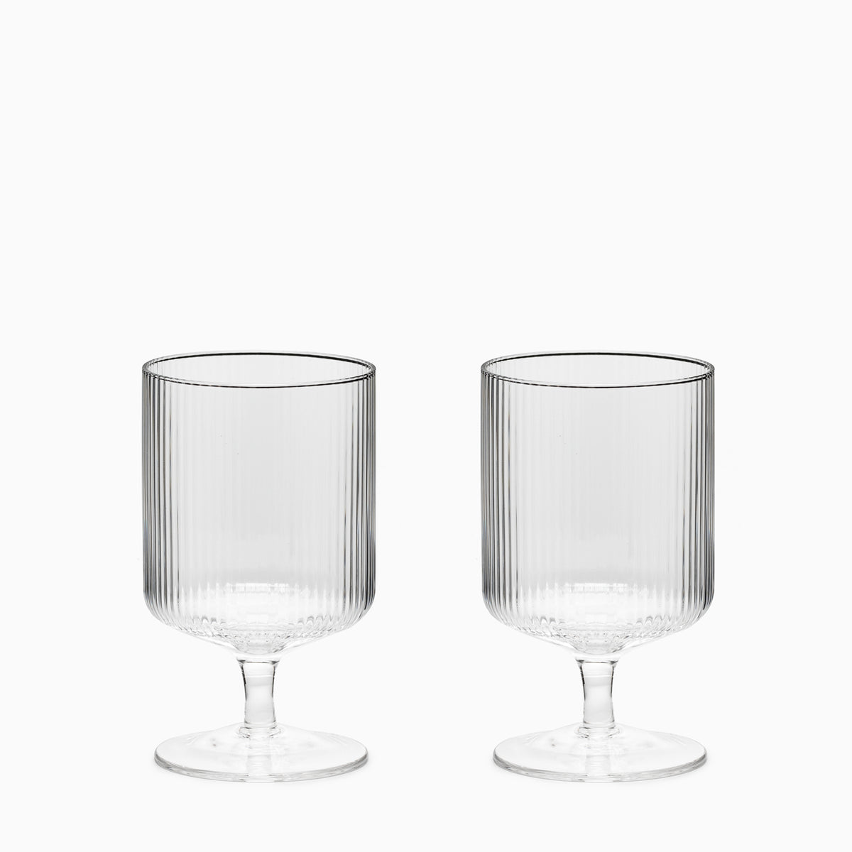 https://www.oldfaithfulshop.com/cdn/shop/products/Ferm-Living-Ripple-Wine-Glasses-Set-of-two-1.jpg?crop=center&height=1200&v=1645663494&width=1200